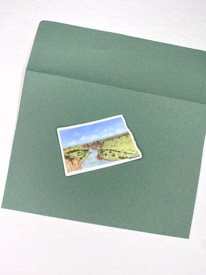 Green envelope with a waterproof Sticker on a white background